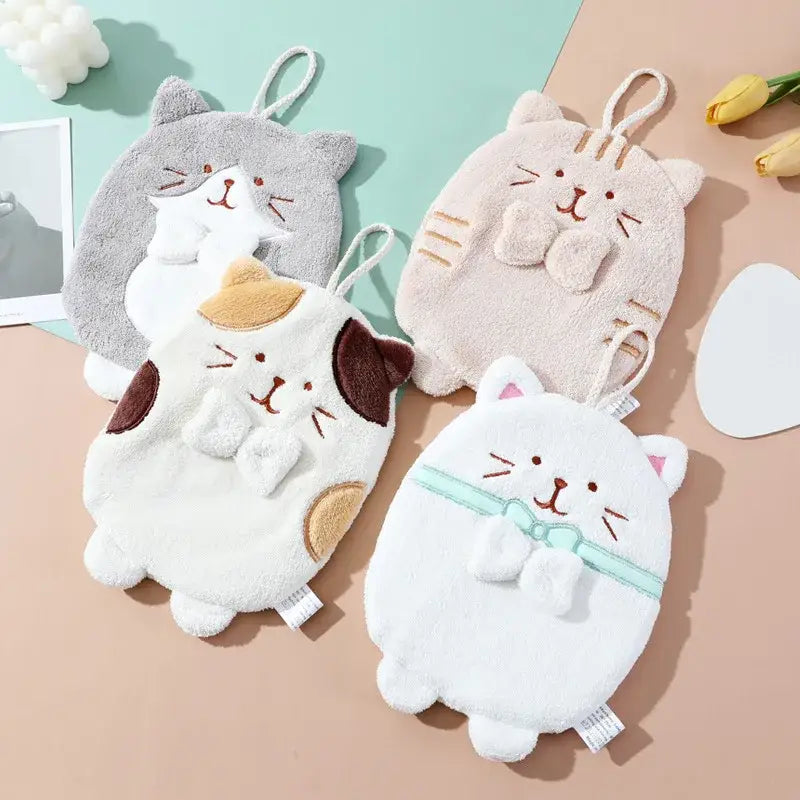 Soft plush cat hand towels in gray beige calico and white with embroidered faces and bow ties for bathroom use