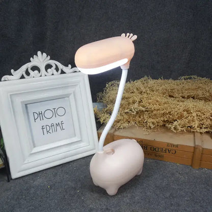Pastel pink pig-shaped decorbites elk night lamp with flexible white neck and glowing light for bedroom desk decor