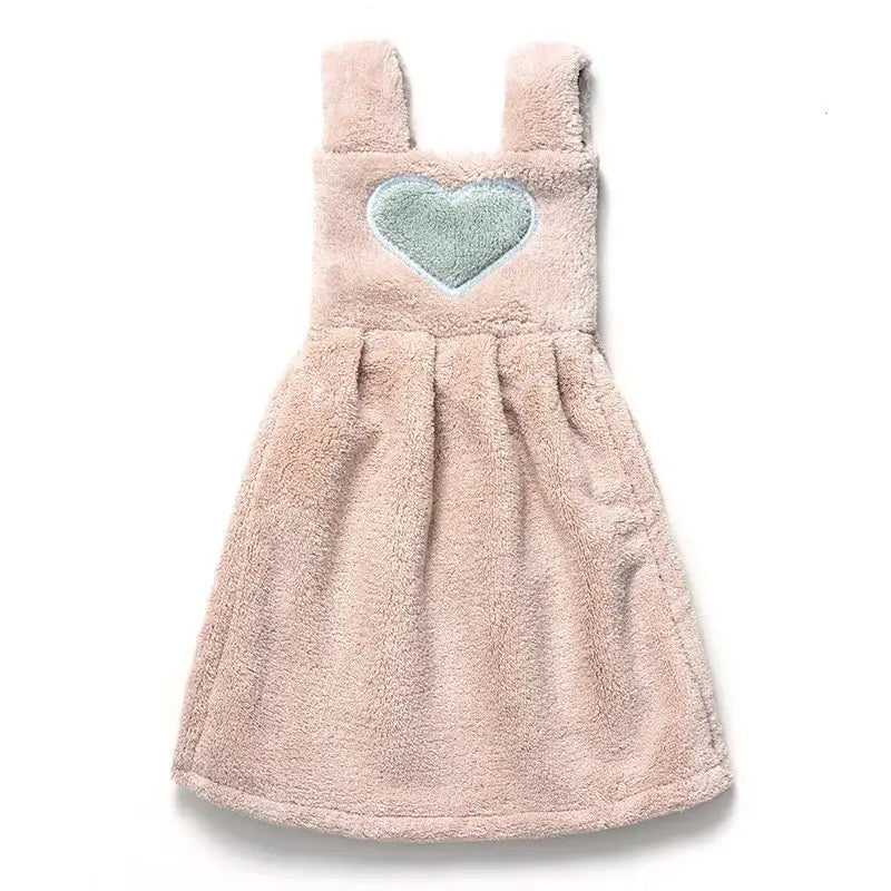 A soft pink plush hand towel dress with a light blue heart patch for cute cartoon hand towel kitchen decor