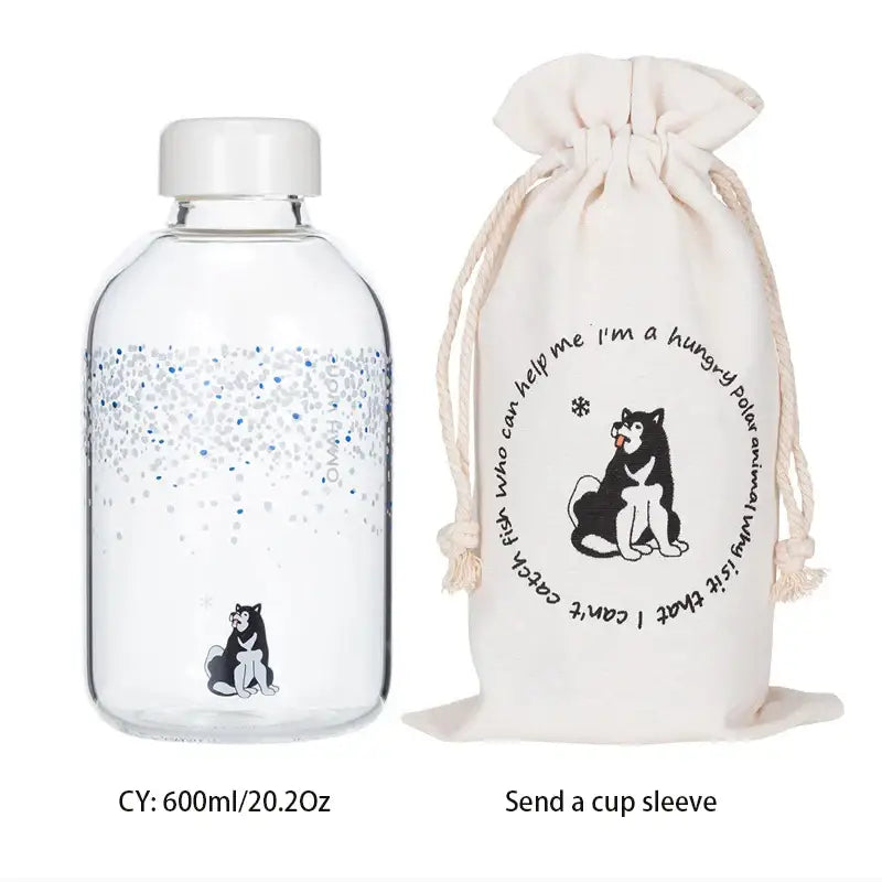 Clear glass water bottle with white cap featuring silver blue glitter gradient and husky illustration by decorbites blue glass water