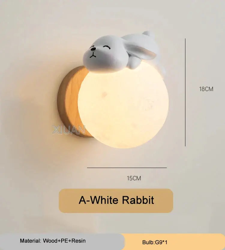 A soft glowing white rabbit-shaped wall light with wooden base and resin finish for decorbites cartoon animal wall decor