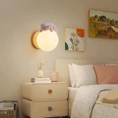 Soft lavender polar bear cartoon animal wall light with warm glowing spherical lamp for bedroom decorbites cartoon animal lighting