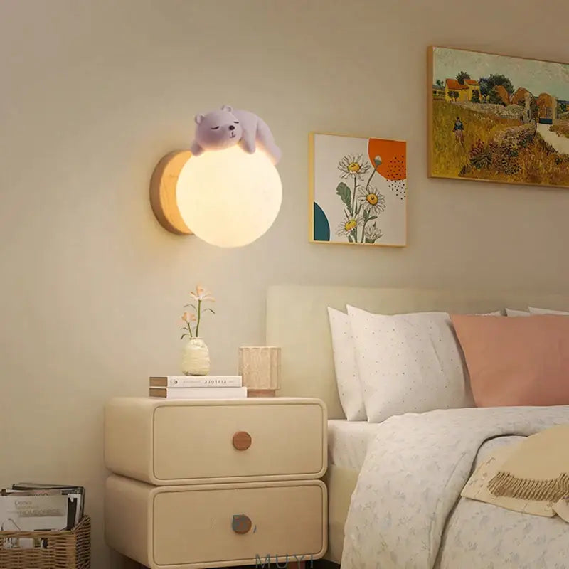 Soft lavender polar bear cartoon animal wall light with warm glowing spherical lamp for bedroom decorbites cartoon animal lighting