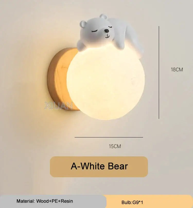 A soft glowing white polar bear cartoon animal wall light with wooden base and resin finish for bedroom lighting decorbites cartoon animal wall