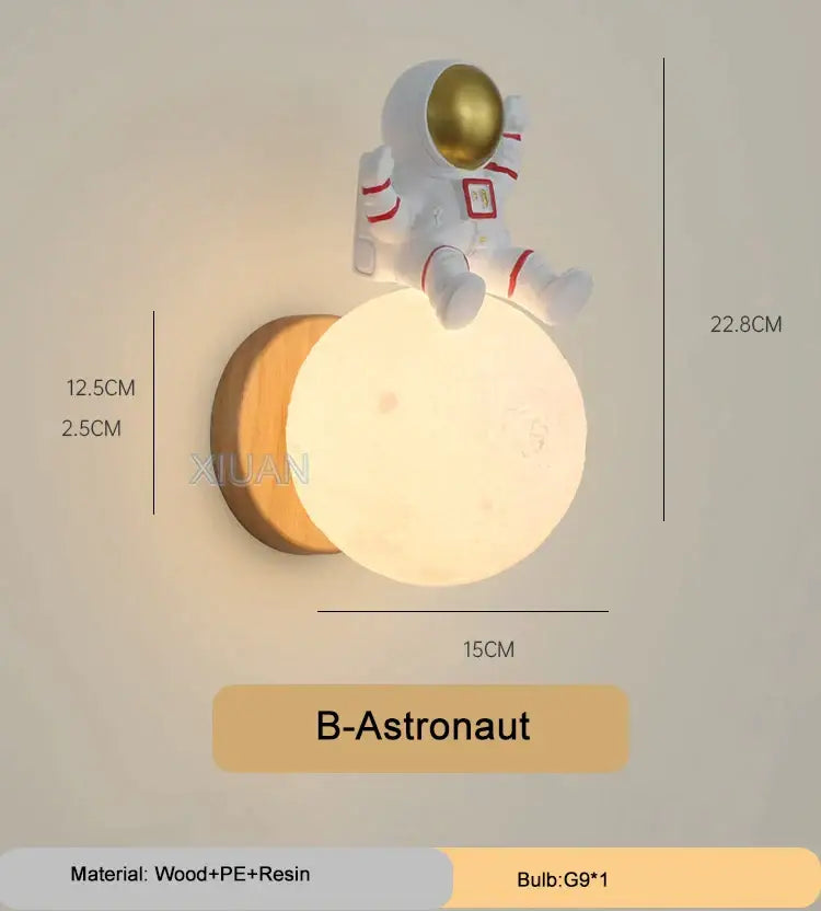 White astronaut figurine with gold helmet on wooden base above illuminated moon lamp for decorbites cartoon animal wall light