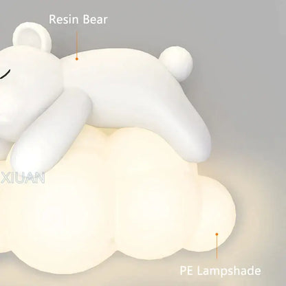 White resin cute polar bear resting on a cloud-shaped pe lampshade for kids bedroom wall lamp decor