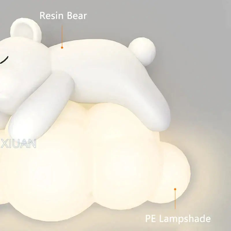 White resin cute polar bear resting on a cloud-shaped pe lampshade for kids bedroom wall lamp decor