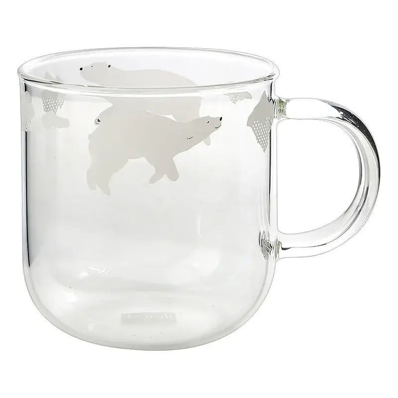 Clear glass coffee mug with frosted white polar bear and silver mesh patterns heat resistant for kitchen use