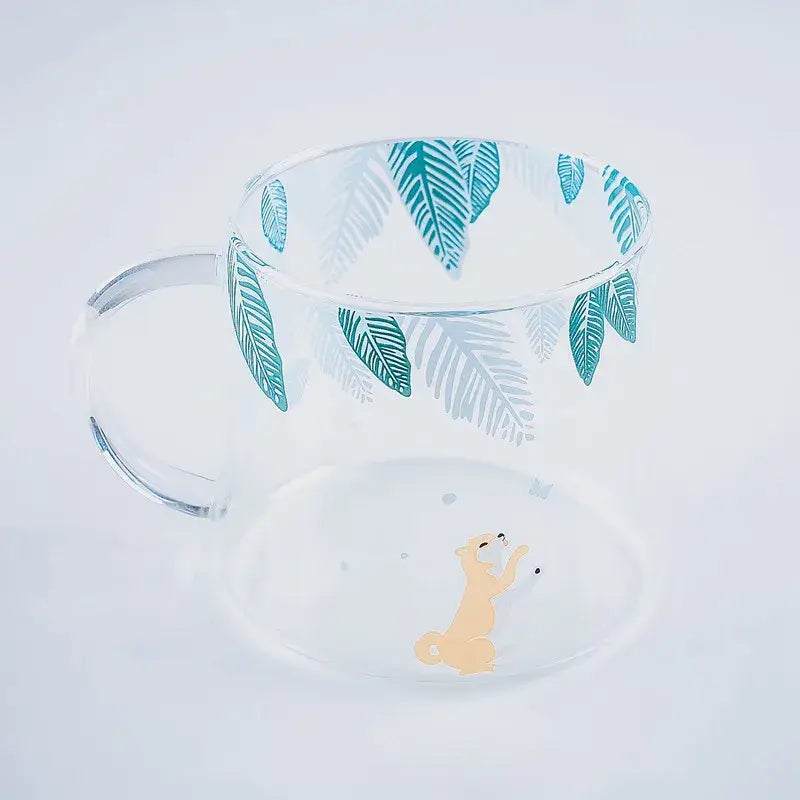 Cute polar bear glass coffee mug with teal and gray leaf patterns and a small orange fox, heat resistant for kitchen use