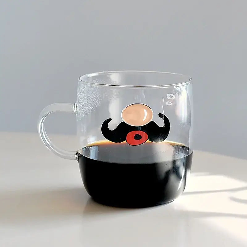 Clear glass coffee mug with cartoon mustache design in black red and beige heat resistant for tea or coffee use