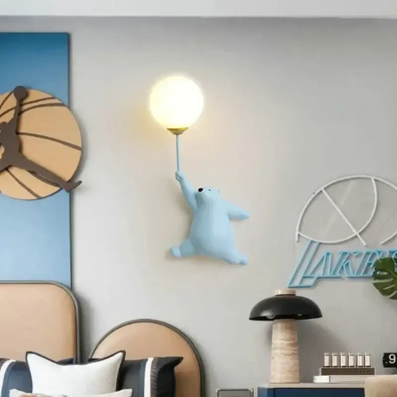 Light blue bear wall lamp shaped like a polar bear holding a glowing spherical lamp for bedroom light