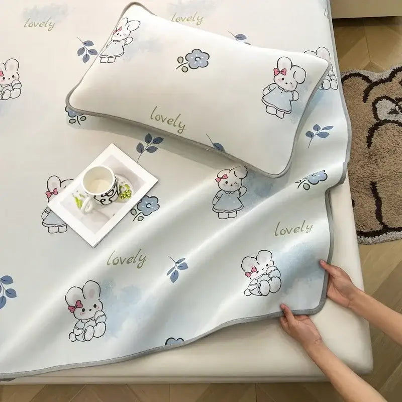 White pillow with cute cartoon rabbit design gray trim from decorbites cooling ice silk mattress set for bedroom decor