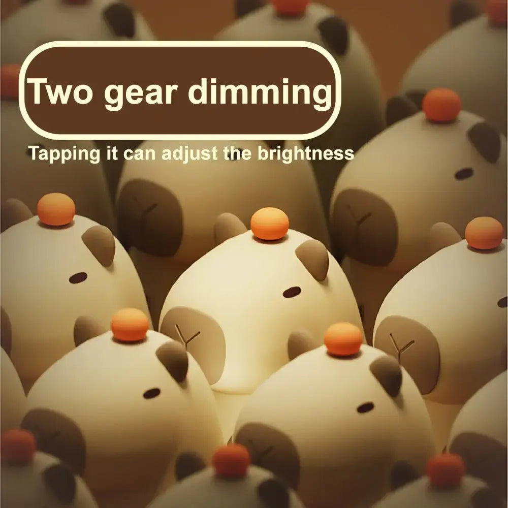 Cute cream-colored decorbites capybara silicone night light with orange button and brown ear details for bedroom decor