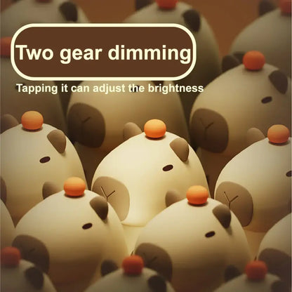 Cute cream-colored decorbites capybara silicone night light with orange button and brown ear details for bedroom decor