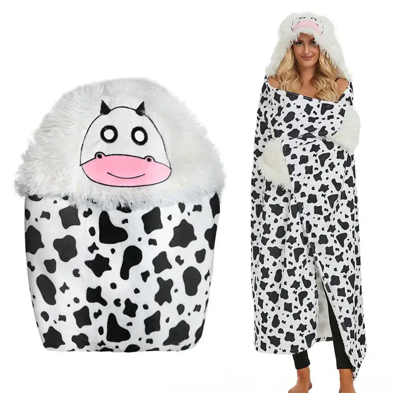 A cozy plush cow-themed lap blanket with a white black spotted pattern and a fluffy hood, perfect for decorbites cute leopard fans