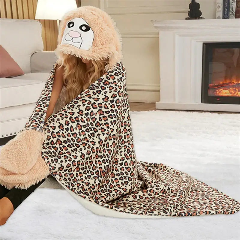 A cozy beige and brown plush leopard-print lap blanket with hood featuring a cute cartoon animal face decorbites cute leopard