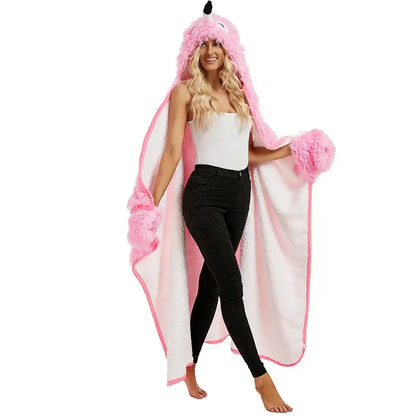 Pink and white fluffy unicorn hooded towel with soft plush texture paired with cute leopard flannel lap blanket decorbites