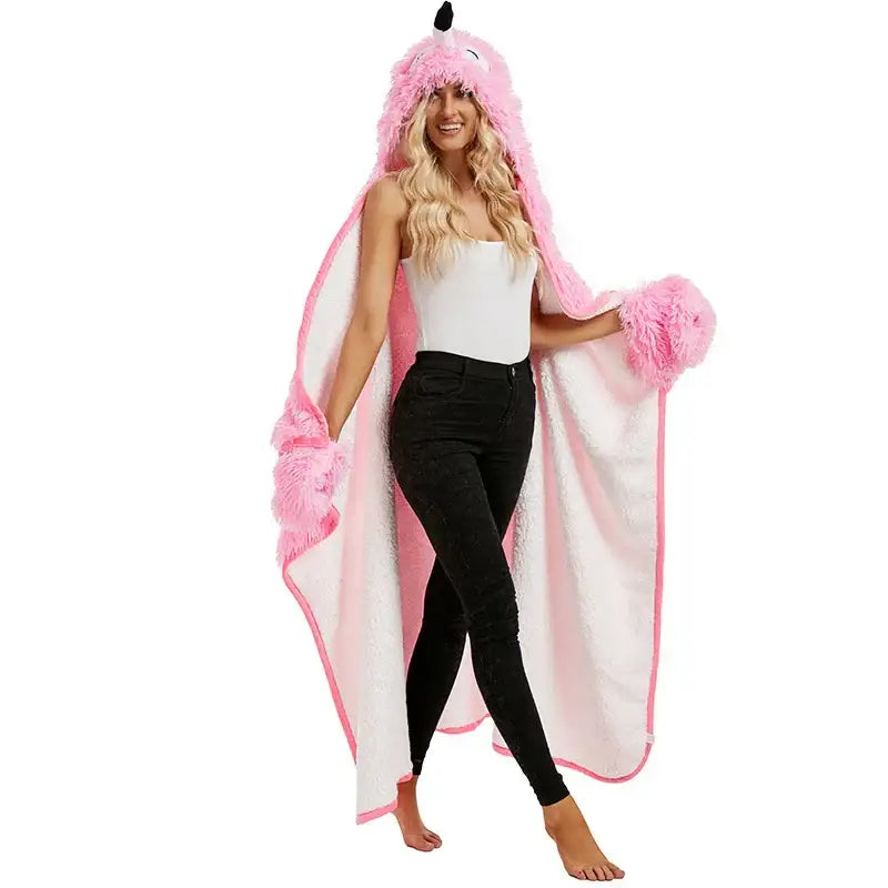 Pink and white fluffy unicorn hooded towel with soft plush texture paired with cute leopard flannel lap blanket decorbites