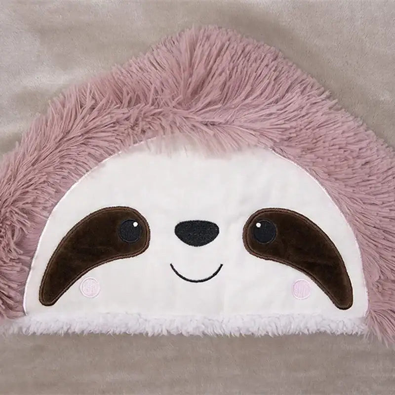 A plush beige and pink sloth-themed flannel lap blanket with embroidered facial features perfect for cozy decorbites cute leopard use