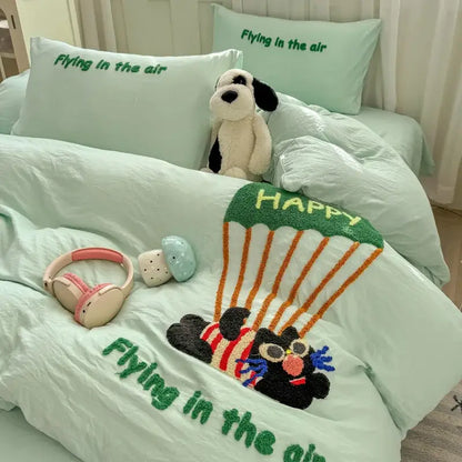 Mint green plush bed set with cartoon bear parachuting design and flying in the air text decorbites cartoon embroidery bed