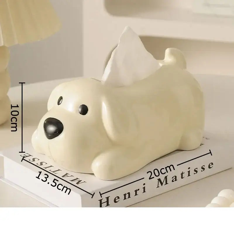 Cream-colored ceramic tissue box shaped like a sleeping cartoon puppy for decorbites cartoon puppy tissue decor