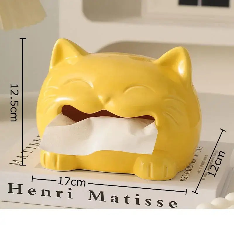 Yellow ceramic cat-shaped tissue box with smiling face holding white tissues for decorbites cartoon puppy tissue decor