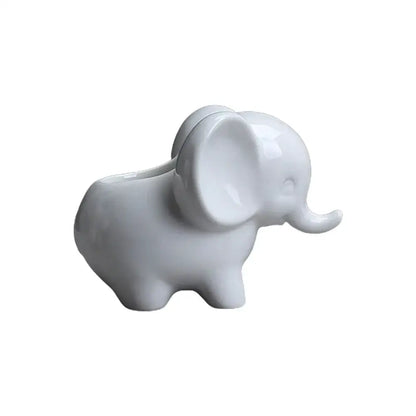 White ceramic elephant succulent planter with smooth glossy finish and rounded features for bedroom decor