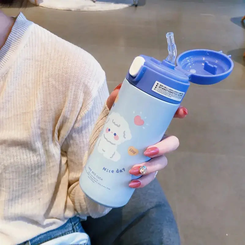 Light blue stainless steel vacuum flask straw cup with cartoon puppy design and purple lid for kitchen use
