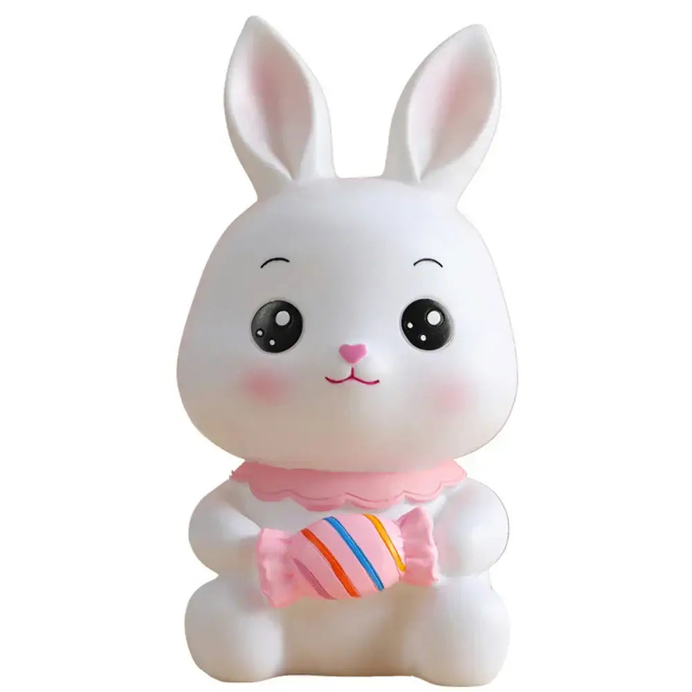 Cute white ceramic bunny piggy bank with pink accents holding striped candy money box decorbites bunny piggy for kids bedroom decor
