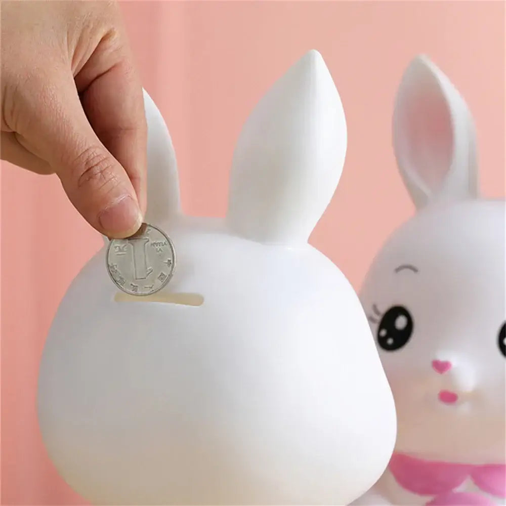 White ceramic bunny piggy bank with coin slot on back ideal as a kids bedroom money box and decorbites bunny piggy money box