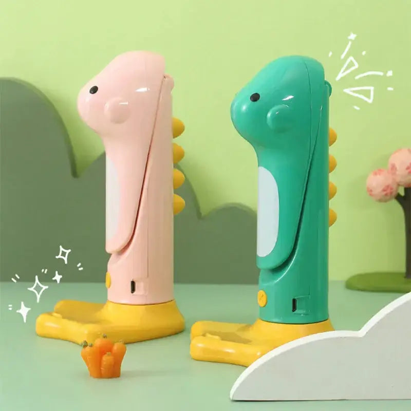 Two colorful cartoonish dino-shaped handheld hair dryers with pink and teal bodies and yellow spines as cute dinosaur led night decor
