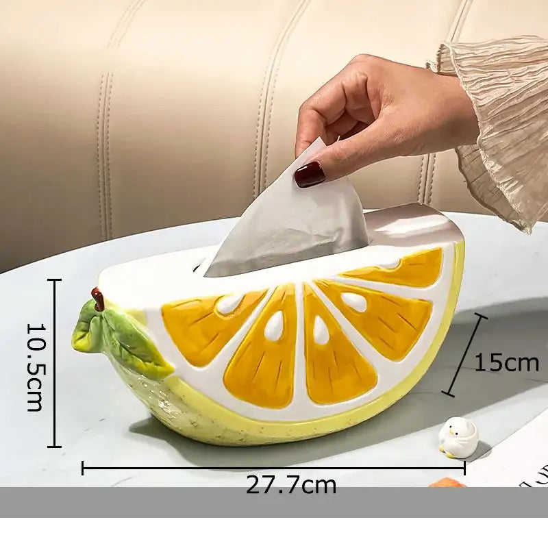 Cute yellow lemon ceramic tissue box featuring green leaves and white pith details for bedroom table decorbites decor