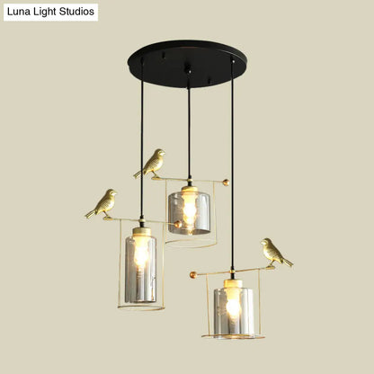 Cylinder Cluster Pendant Dining Room Lamp - Cream/Smoke Gray Glass, Modernism Design with Gold Bird Deco (3 Bulbs)