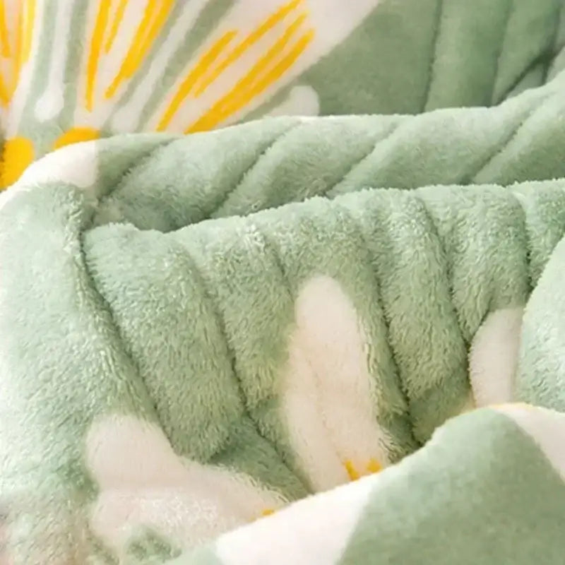 Soft mint green cozy milk velvet blanket with ribbed texture and white floral embroidery for bedroom warmth decorbites cozy milk