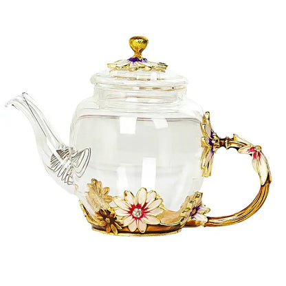 Clear glass teapot set with ornate gold enamel floral decorations and pink crystal accents for dining room use