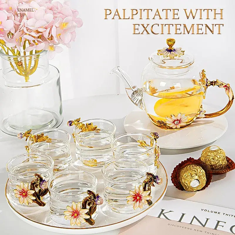 Clear glass teapot set with gold and enamel floral decorations in pink crystal glass for dining room drinkware