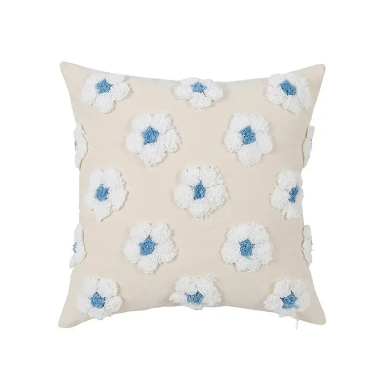 Beige cushion cover with white and blue textured floral appliqués in decorbites daisy flora embroidered style for living room decor