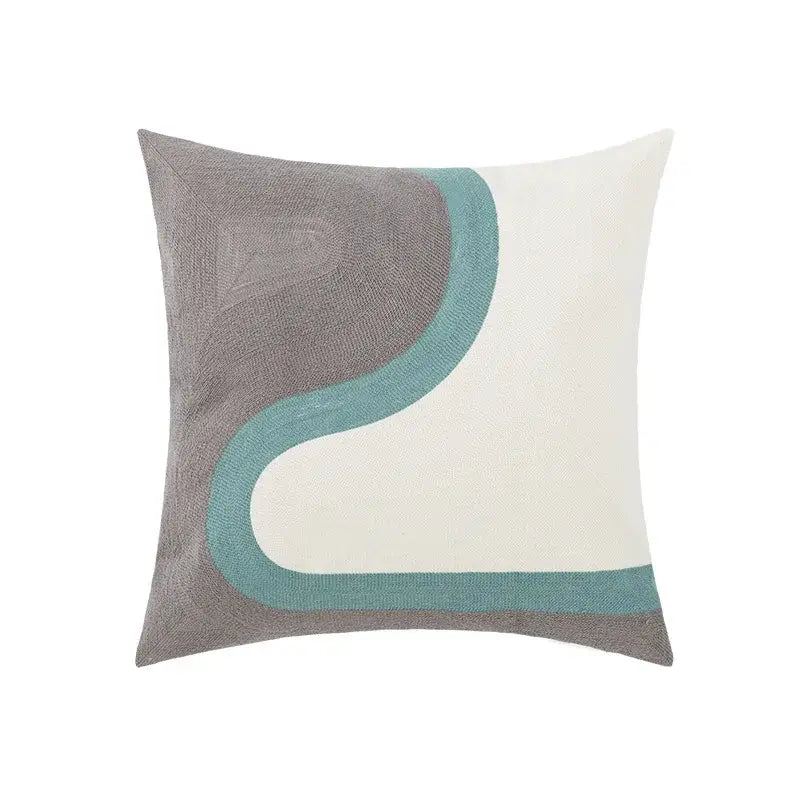 A square cushion with daisy floral geometric embroidery in textured gray cream and teal fabric for living room decorbites decor