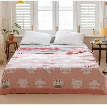 Pink double cotton blanket featuring a cartoon cat face pattern for bedroom bed cover use