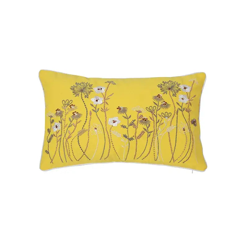 Bright yellow pillow cover with dandelion floral embroidery in white brown and beige for living room decor