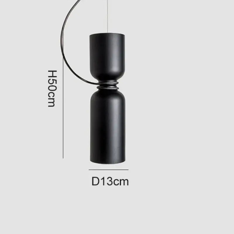 Black matte Danish wrought iron pendant light with ceramic detail and LED bulb for kitchen use, featuring curved wire