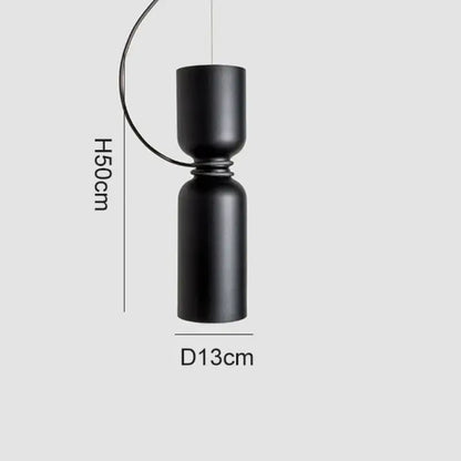 Black matte Danish wrought iron pendant light with ceramic detail and LED bulb for kitchen use, featuring curved wire