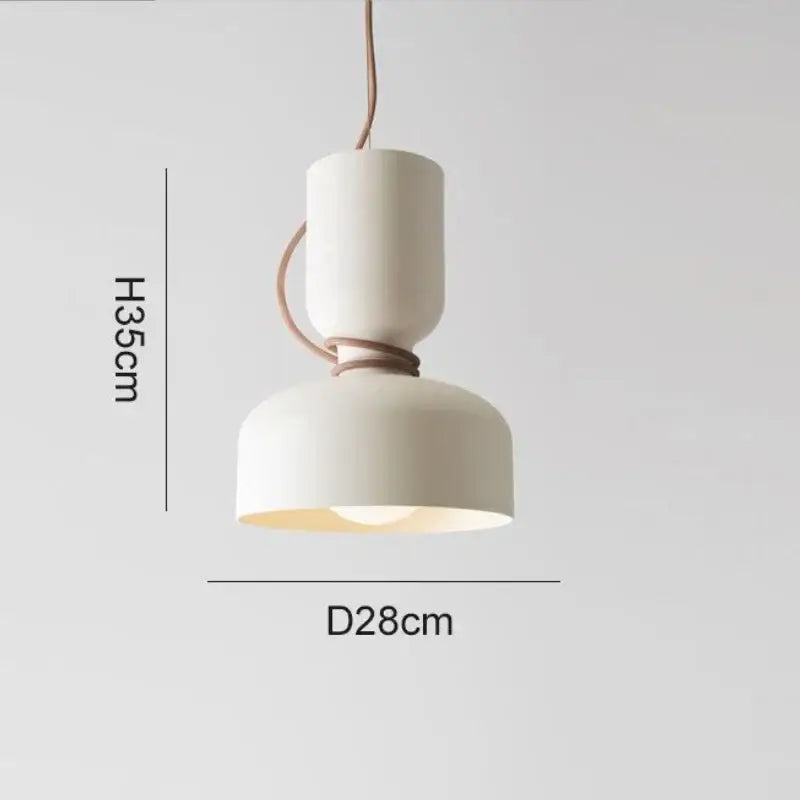Cream-colored ceramic pendant light with woven rope detail and wrought iron cord pendant for modern kitchen lighting