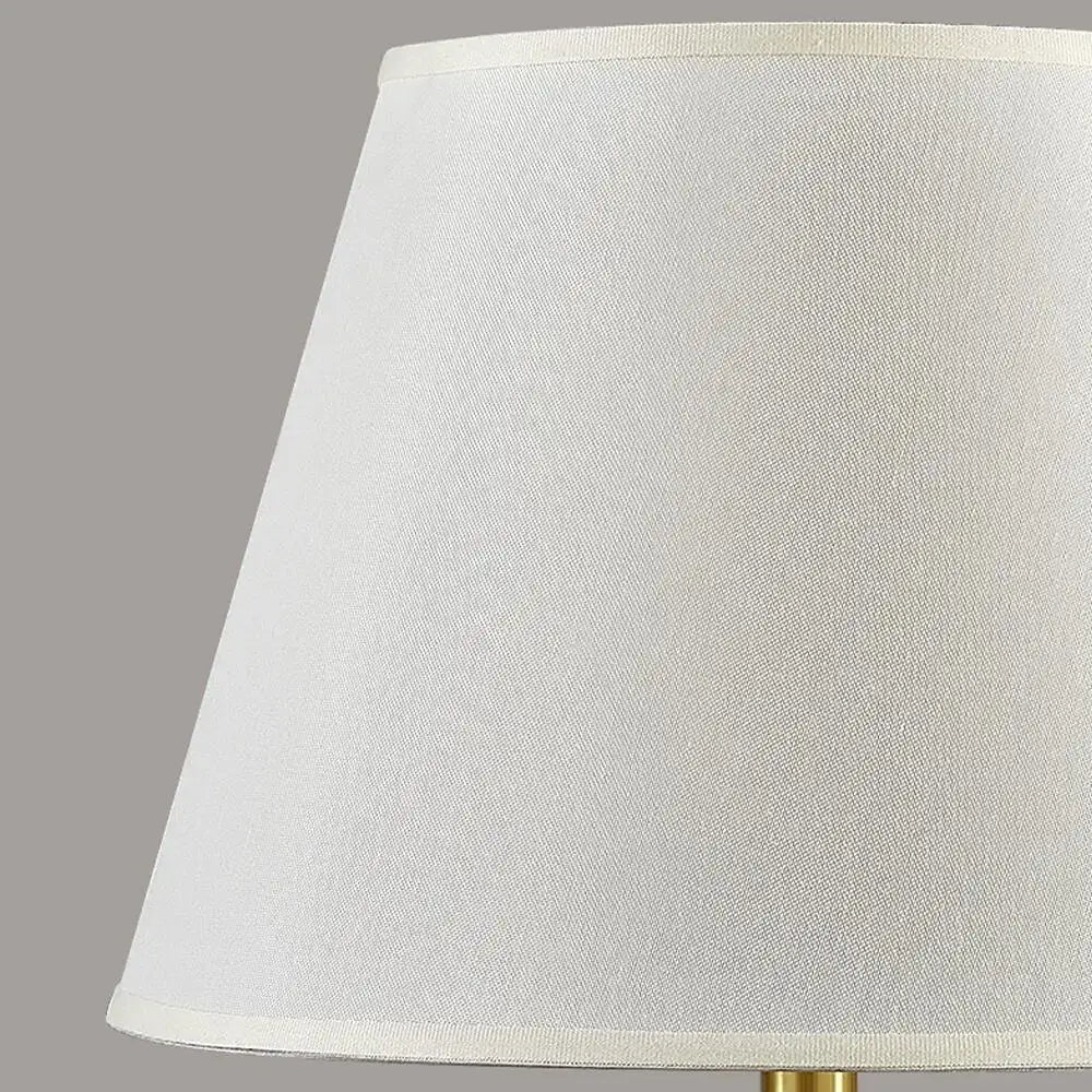 Dark blue ceramic table lamp with remote control featuring a white textured fabric lampshade for bedroom decorbites