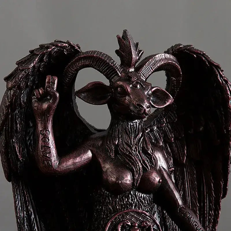 Dark bronze baphomet horned devil statue with intricate horns feathered wings and detailed beard for office gothic decor