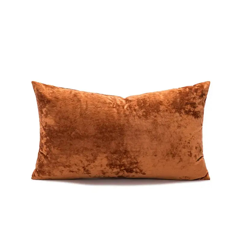 A rectangular dark grain rust-colored velvet pillow cover with a soft textured surface for living room decorbites decor