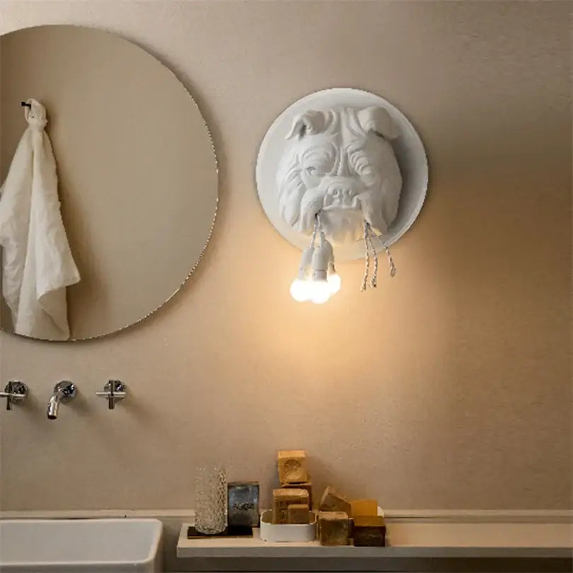 White ceramic bulldog wall lamp with three exposed bulbs hanging from mouth for living room decorbites wall lamp