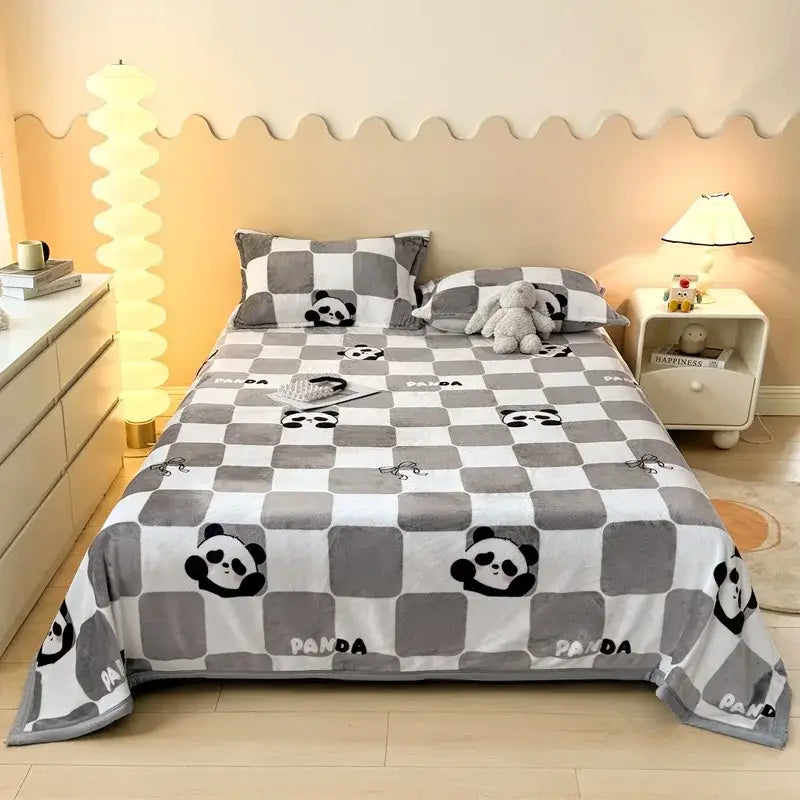 Dark gray cartoon print flannel sofa cover featuring a gray and white checkered blanket with panda faces and panda text