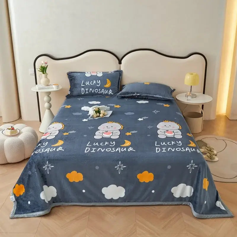 Dark gray cartoon print flannel sofa cover featuring blue plush blanket with cartoon dinosaurs and stars pattern decorbites cartoon print