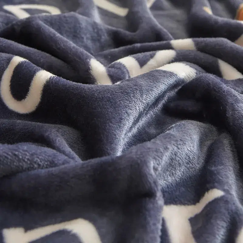 Navy blue plush blanket with cream lettering featuring decorbites cartoon print flannel sofa cover for living room use